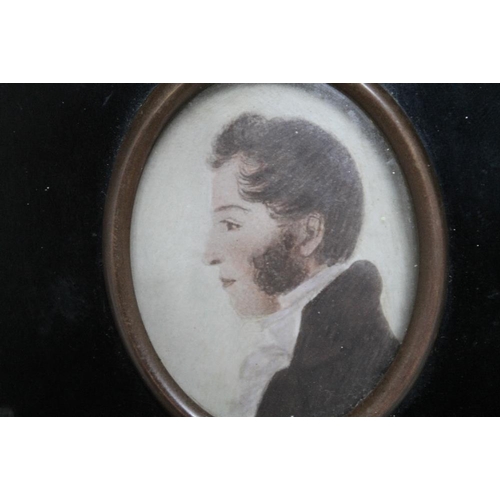 124 - A GEORGIAN STYLE MINIATURE OF A GENTLEMAN, together with a framed image of a lady, H 15 cm