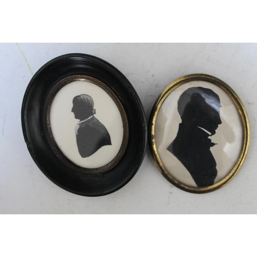 125 - FOUR FRAMED SILHOUETTES, tallest H 14.5 cm