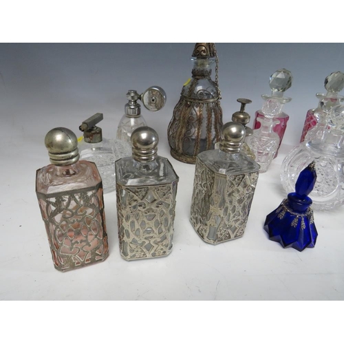 191 - A COLLECTION OF SIXTEEN ASSORTED GLASS PERFUME BOTTLES, ATOMISERS, VANITY JARS ETC.,  to include a s... 