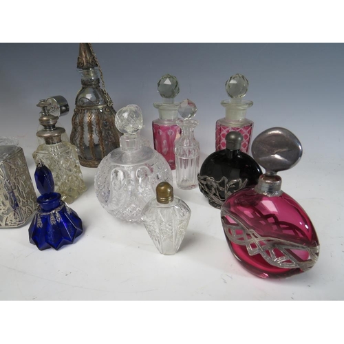 191 - A COLLECTION OF SIXTEEN ASSORTED GLASS PERFUME BOTTLES, ATOMISERS, VANITY JARS ETC.,  to include a s... 