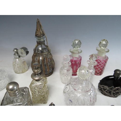 191 - A COLLECTION OF SIXTEEN ASSORTED GLASS PERFUME BOTTLES, ATOMISERS, VANITY JARS ETC.,  to include a s... 