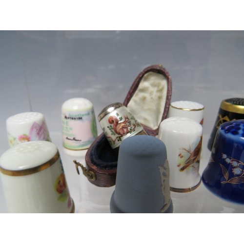 194 - A COLLECTORS CABINET AND  CONTENTS, to include a collection of hallmarked silver and ceramic thimble... 