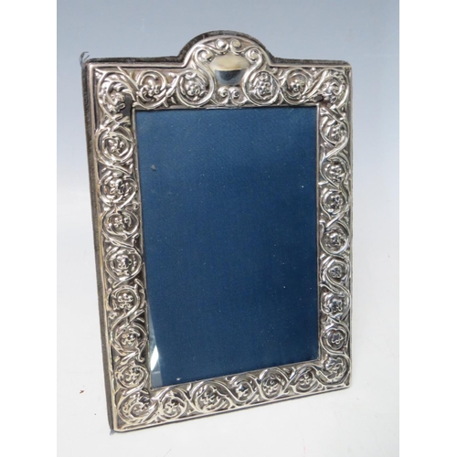 206 - A COLLECTION OF FOUR HALLMARKED SILVER EASEL BACKED PHOTO FRAMES, varying sizes, dates and makers, t... 