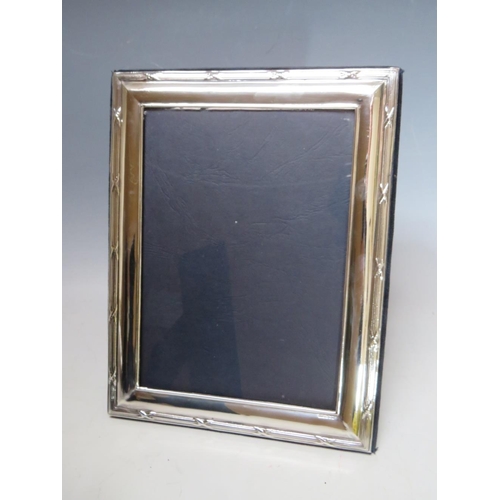 206 - A COLLECTION OF FOUR HALLMARKED SILVER EASEL BACKED PHOTO FRAMES, varying sizes, dates and makers, t... 