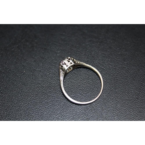 291 - AN ILLUSION SET DIAMOND SOLITAIRE RING, in white metal stamped 18k, approx weight 2.1g, ring size P