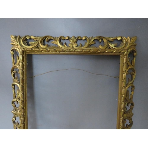 32 - A 19TH CENTURY CARVED WOODEN FLORENTINE GOLD FRAME, frame W 10 cm, rebate 62 x 46 cm