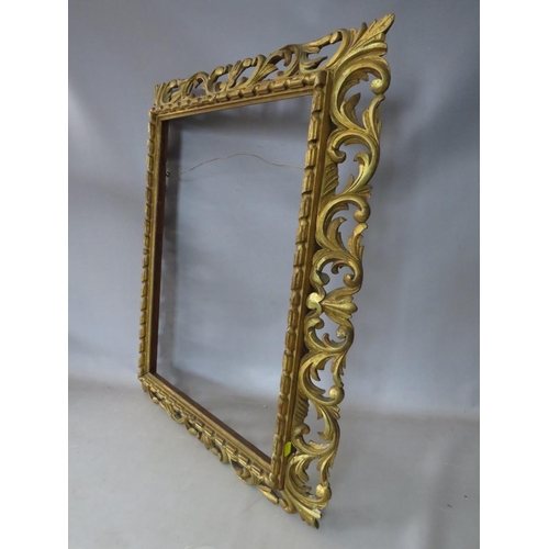 32 - A 19TH CENTURY CARVED WOODEN FLORENTINE GOLD FRAME, frame W 10 cm, rebate 62 x 46 cm