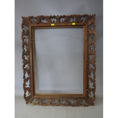 32 - A 19TH CENTURY CARVED WOODEN FLORENTINE GOLD FRAME, frame W 10 cm, rebate 62 x 46 cm