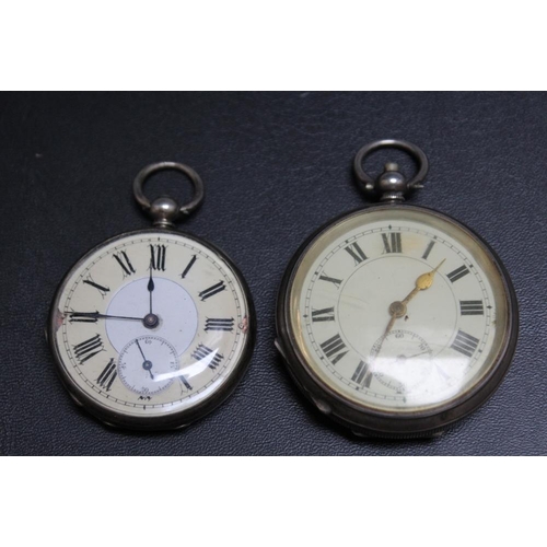 323 - TWO SILVER CASED OPEN FACED POCKET WATCHES, Dia 5 cm