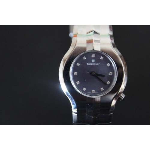 325 - A MODERN LADIES TAG 'ALTO EGO' WATCH, on chrome effect bracelet, Dia 2.75 cm