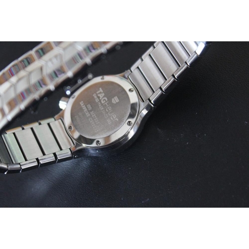 325 - A MODERN LADIES TAG 'ALTO EGO' WATCH, on chrome effect bracelet, Dia 2.75 cm