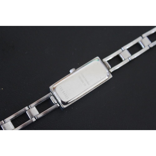 326 - A MODERN RECTANGULAR DIAL LADIES TED BAKER WATCH, on stainless steel bracelet, W 1.3 cm