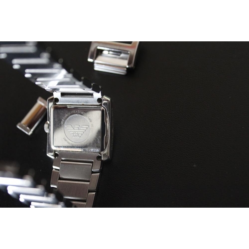 328 - A LADIES GIORGIO ARMANI STAINLESS STEEL WRISTWATCH, with spare link, W 2.75 cm