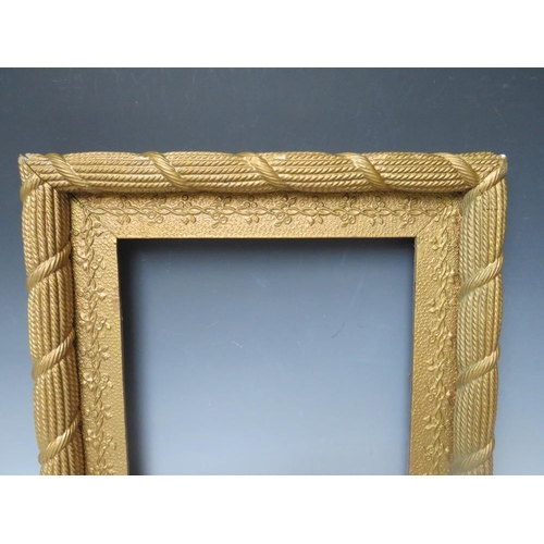 33 - A 19TH CENTURY GOLD ROPE EFFECT FRAME, with decorative gold slip, with restoration, frame W 3.5 cm, ... 