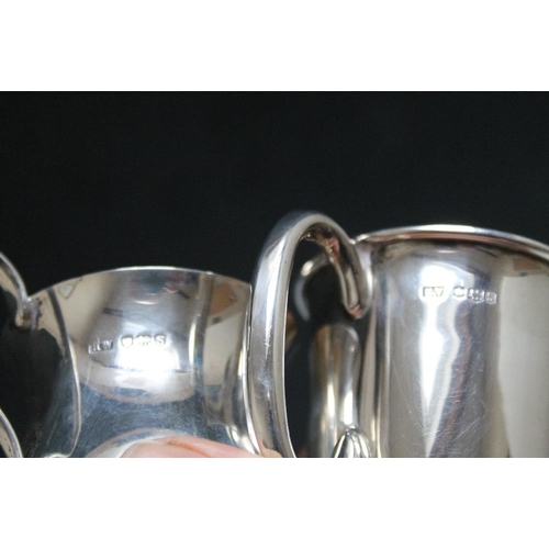 345 - TWO HALLMARKED SILVER CHRISTENING CUPS, various dates and makers, approx combined weight 187g, talle... 