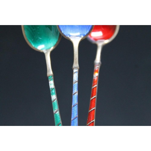 349 - A CASED SET OF SIX HARLEQUIN ENAMEL SILVER GILT COFFEE SPOONS, stamped 'ELa Denmark STERLING 925 S, ... 