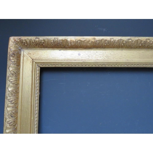 36 - A 19TH CENTURY GOLD WATTS FRAME, with acanthus leaf design to pouter edge - some restorations. frame... 