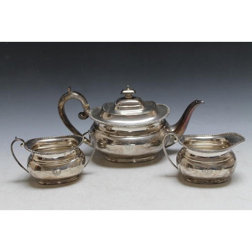 360 - A HALLMARKED SILVER THREE PIECE TEA SERVICE BY HARRISON BROTHERS AN HOWSON - SHEFFIELD 1946, with th... 