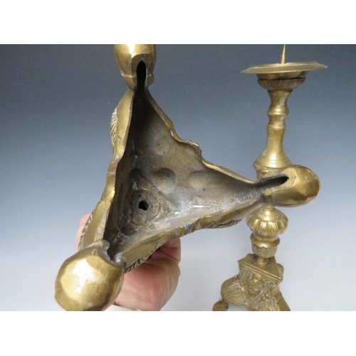 402 - A PAIR OF DECORATIVE BRASS PRICKET CANDLESTICKS, with cherubic mask detail, H 43 cm (2)