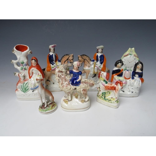 444 - A COLLECTION OF SEVEN 19TH CENTURY STAFFORDSHIRE POTTERY, to include a pair of equestrian flatbacks,... 