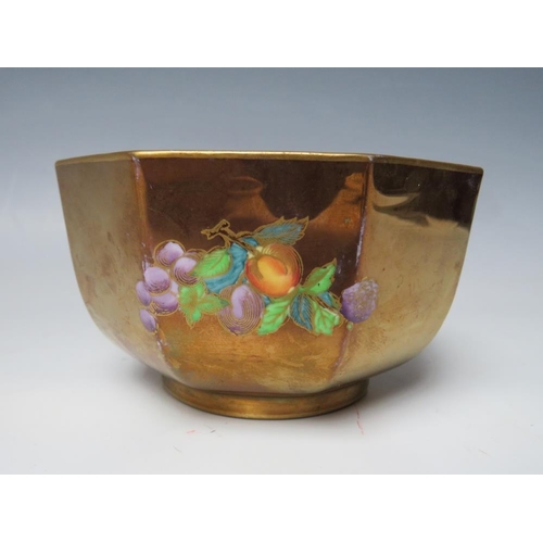 459 - A WEDGWOOD LUSTRE OCTAGONAL BOWL, decorated with fruit inside and out,  Dia. 12 cm