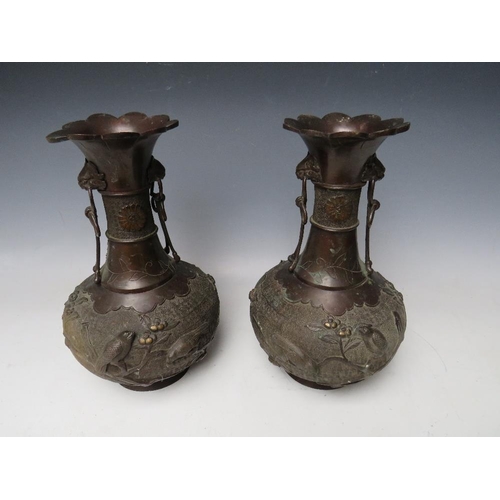 465 - A PAIR OF LATE 19TH / EARLY 20TH CENTURY BRONZE ORIENTAL  VASES, of baluster outline, each decorated... 