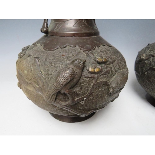 465 - A PAIR OF LATE 19TH / EARLY 20TH CENTURY BRONZE ORIENTAL  VASES, of baluster outline, each decorated... 