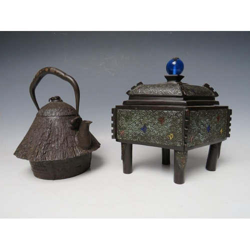 467 - A 20TH CENTURY CAST IRON JAPANESE TEAPOT, together with a brass lozenge shaped casket, the teapot ha... 