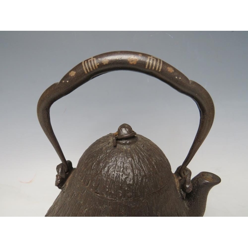 467 - A 20TH CENTURY CAST IRON JAPANESE TEAPOT, together with a brass lozenge shaped casket, the teapot ha... 