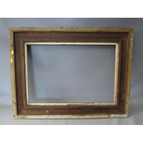 47 - A 19TH CENTURY GOLD FRAME WITH LEAF DESIGN AND INTEGRAL GOLD SLIP, frame W 11 cm, rebate 65 x 45 cm