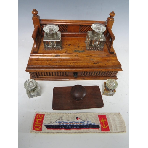 474 - A SMALL DECORATIVE WOODEN DESK STAND WITH SINGLE DRAWER BELOW, complete with two fitted ink bottles ... 