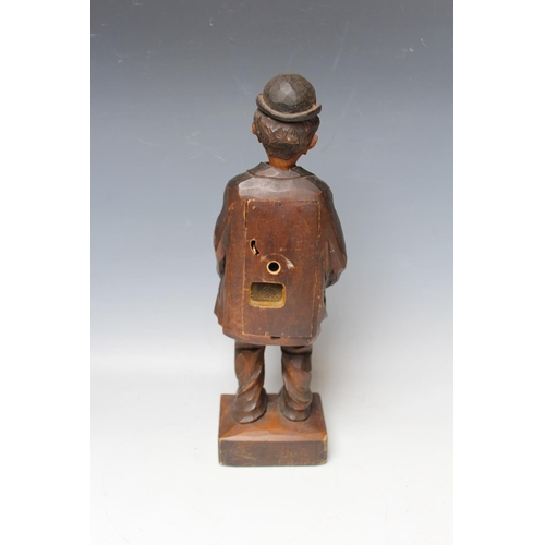 479 - A BLACK FOREST CARVED SOFTWOOD 'WHISTLING FIGURE', circa 1930, in the form of a man with his hands i... 