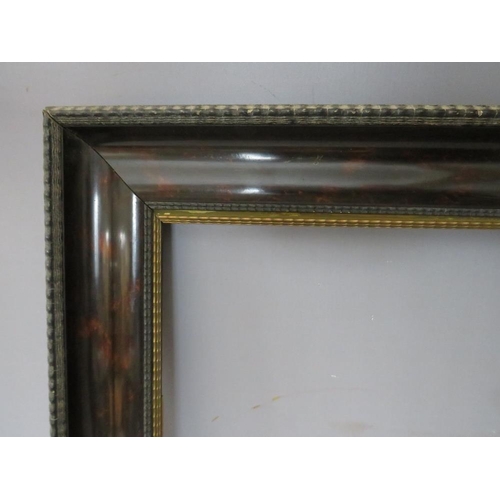 48 - A 19TH CENTURY EBONISED DUTCH FRAME WITH TORTOISESHELL EFFECT TO INNER, frame W 8 cm, rebate 66 x 42... 