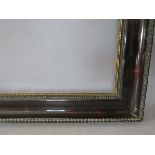 48 - A 19TH CENTURY EBONISED DUTCH FRAME WITH TORTOISESHELL EFFECT TO INNER, frame W 8 cm, rebate 66 x 42... 