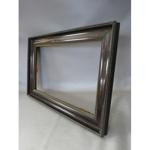 48 - A 19TH CENTURY EBONISED DUTCH FRAME WITH TORTOISESHELL EFFECT TO INNER, frame W 8 cm, rebate 66 x 42... 