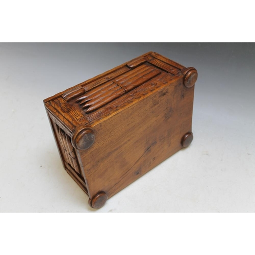 483 - A HEAVILY CARVED CIGAR HUMIDOR BOX,  W 28 cmCondition Report:split at one corner join