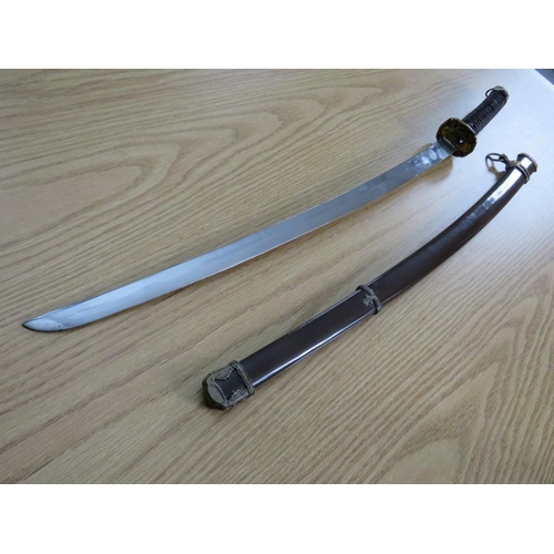 502 - A WW2 JAPANESE OFFICERS SAMURAI SWORD, with gilded fittings and metal saya