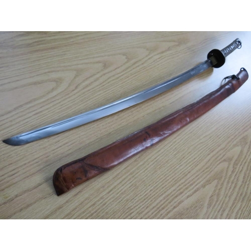 503 - A WW2 JAPANESE SAMURAI KATANA SWORD, with alloy handle, steel saya and leather sheath