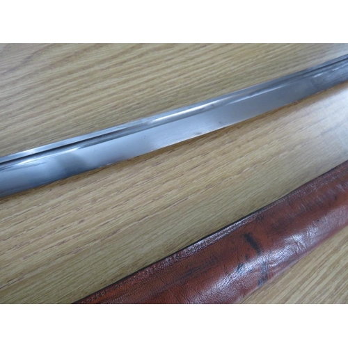 503 - A WW2 JAPANESE SAMURAI KATANA SWORD, with alloy handle, steel saya and leather sheath