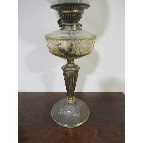 541 - A LATE 19TH CENTURY OIL LAMP, the plated base leading to an etched clear glass reservoir, with etche... 