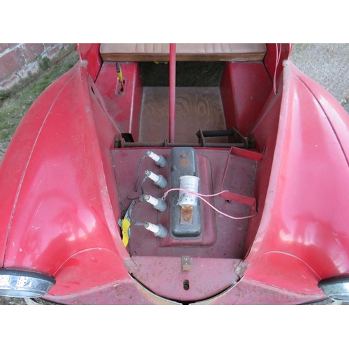 542 - AN ORIGINAL AUSTIN J40 PEDAL CAR, finished in red with chrome fixtures and fittings, complete with h... 