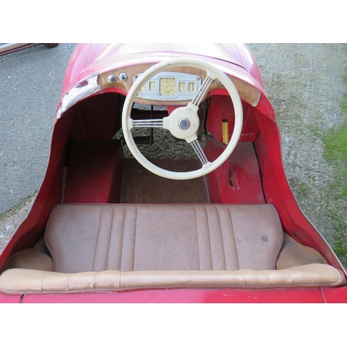 542 - AN ORIGINAL AUSTIN J40 PEDAL CAR, finished in red with chrome fixtures and fittings, complete with h... 