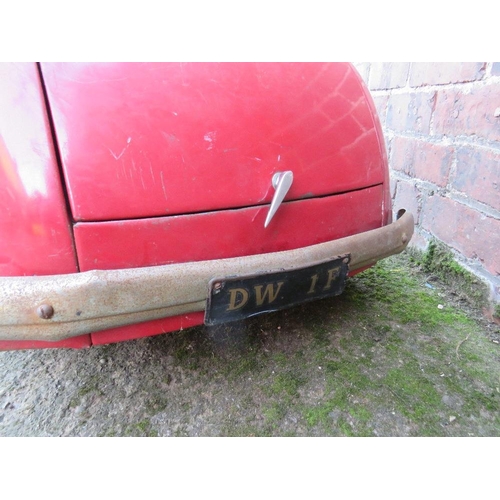 542 - AN ORIGINAL AUSTIN J40 PEDAL CAR, finished in red with chrome fixtures and fittings, complete with h... 