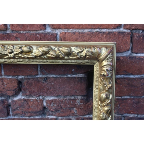 55 - A LATE 18TH / EARLY 19TH CENTURY DECORATIVE GOLD FRAME WITH FRUIT DESIGN, frame W 7.5 cm, rebate 72 ... 