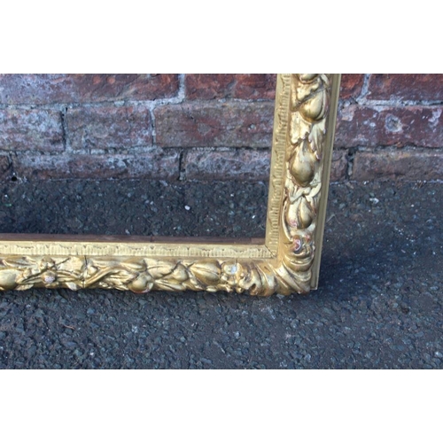 55 - A LATE 18TH / EARLY 19TH CENTURY DECORATIVE GOLD FRAME WITH FRUIT DESIGN, frame W 7.5 cm, rebate 72 ... 