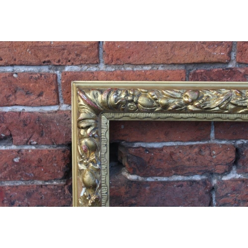 55 - A LATE 18TH / EARLY 19TH CENTURY DECORATIVE GOLD FRAME WITH FRUIT DESIGN, frame W 7.5 cm, rebate 72 ... 