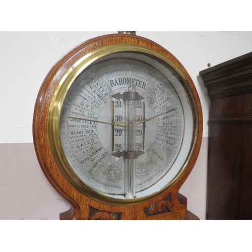 553 - A VINTAGE JOSEPH DAVIS 'AMERICAN FORECAST' OAK CASED BAROMETER, H 108 cm