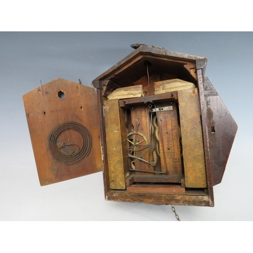 559 - A 19TH CENTURY 8 DAY CUCKOO CLOCK, with brass weights and pendulum, the mahogany octagonal case with... 