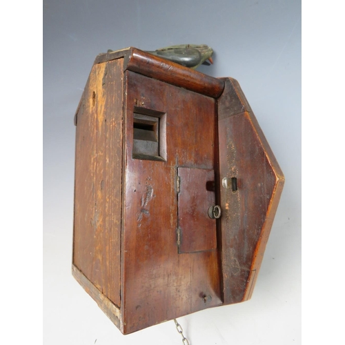 559 - A 19TH CENTURY 8 DAY CUCKOO CLOCK, with brass weights and pendulum, the mahogany octagonal case with... 