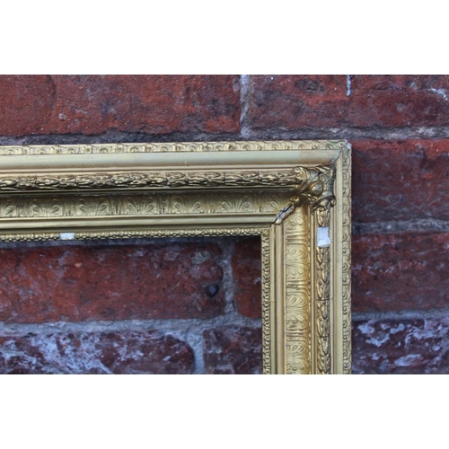 56 - A 19TH CENTURY DECORATIVE GOLD FRAME, with acanthus leaf design to outer edge, frame W 6.5 cm, rebat... 